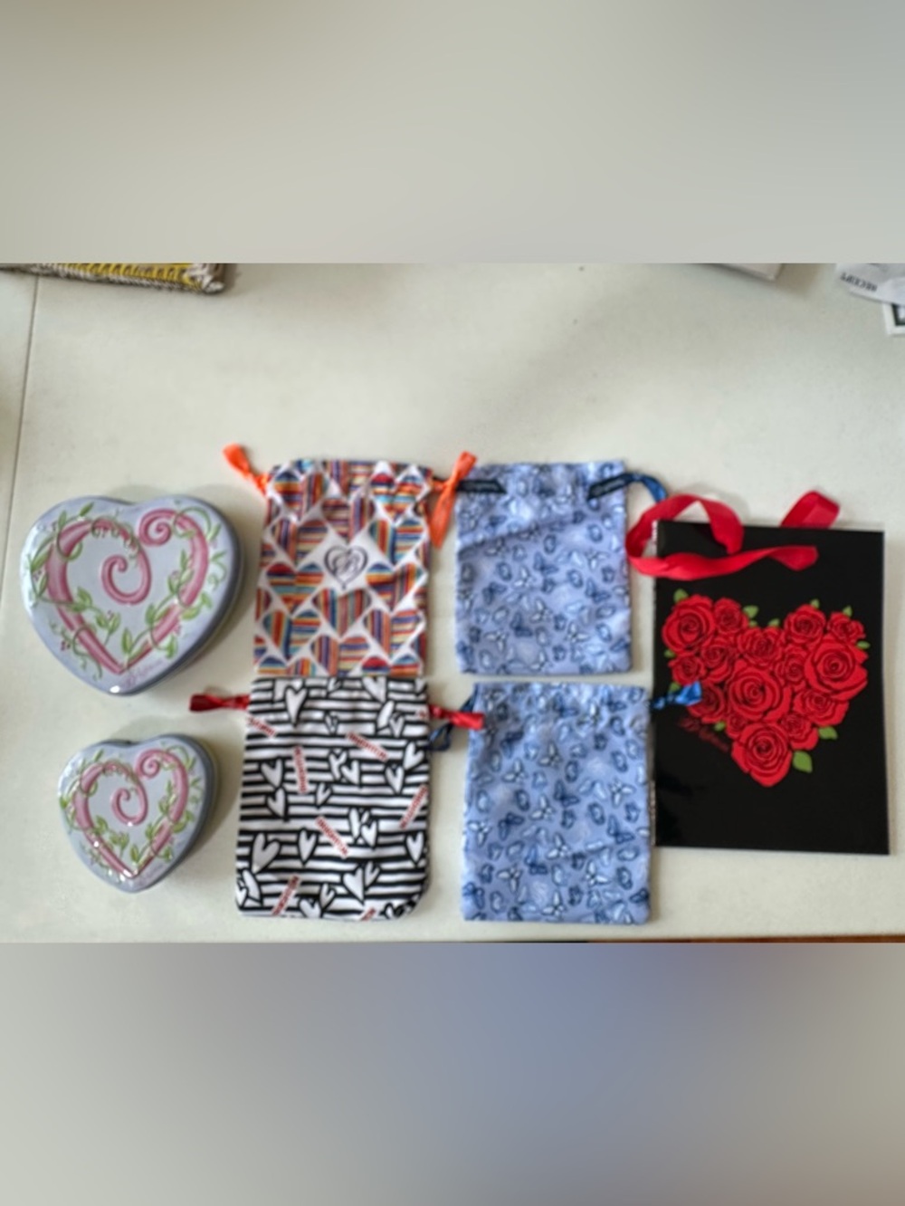 Brighton accessory set, 4 draw string bags, 2 vintage tins & paper bag.